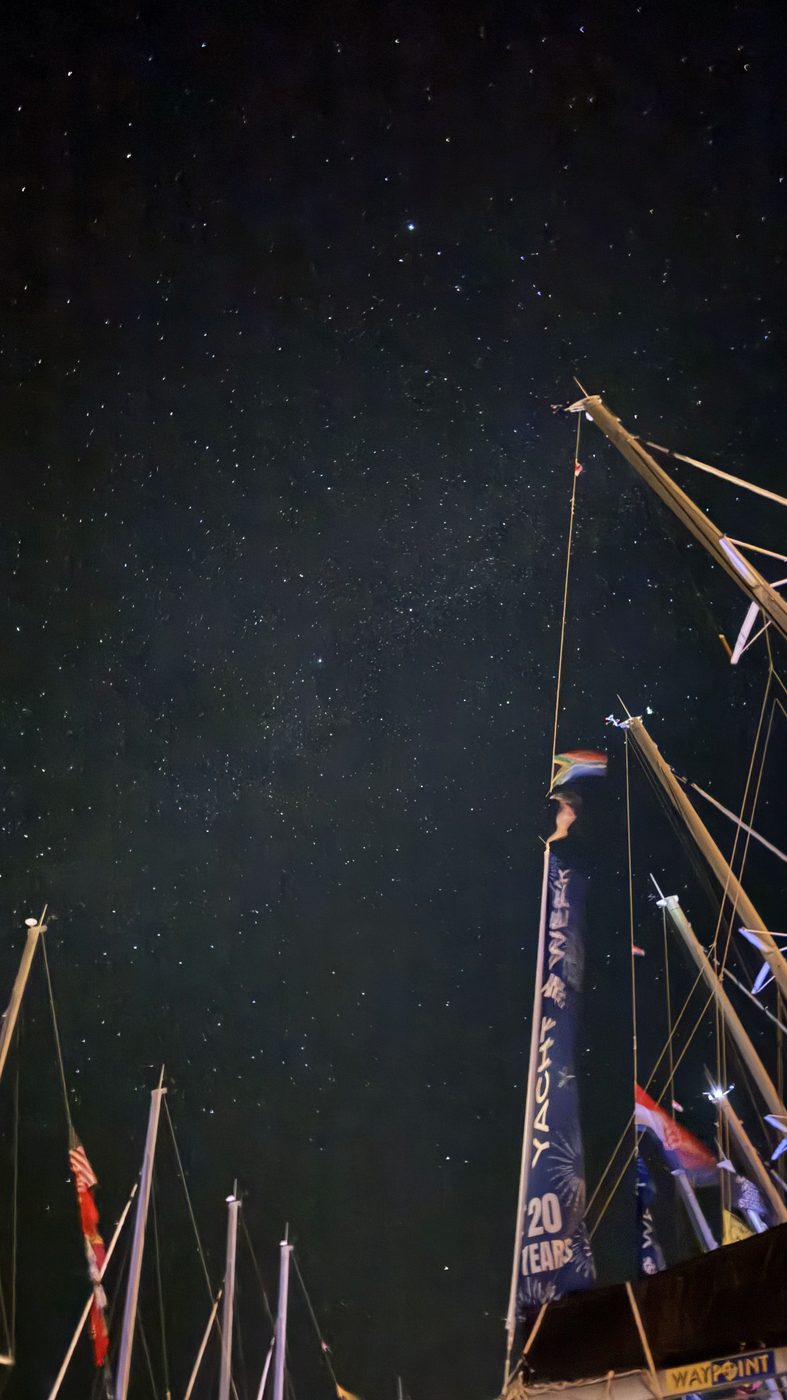 A starry night sky over sailboat masts in Croatia