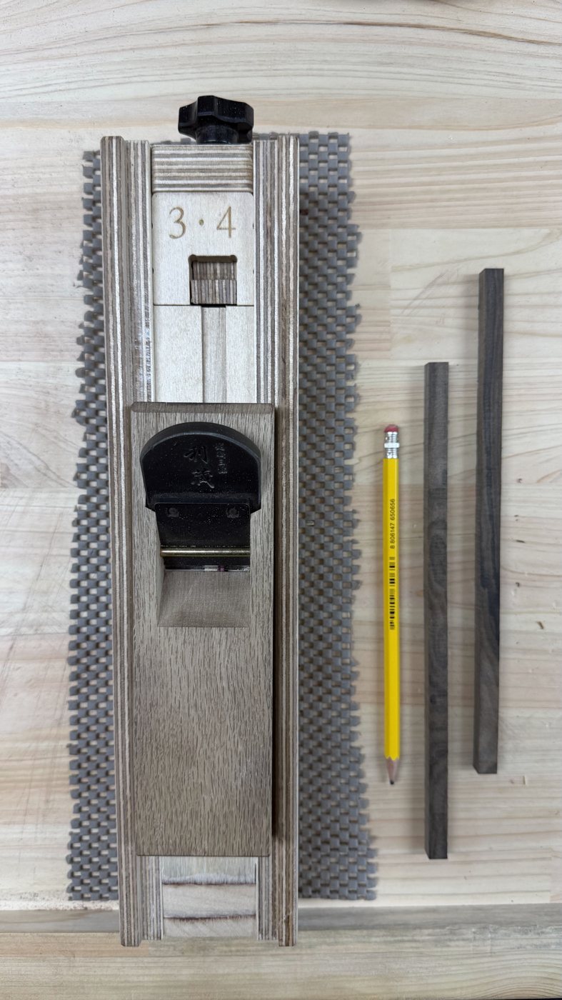 A close-up of a handmade wooden stamp being carved in Korea