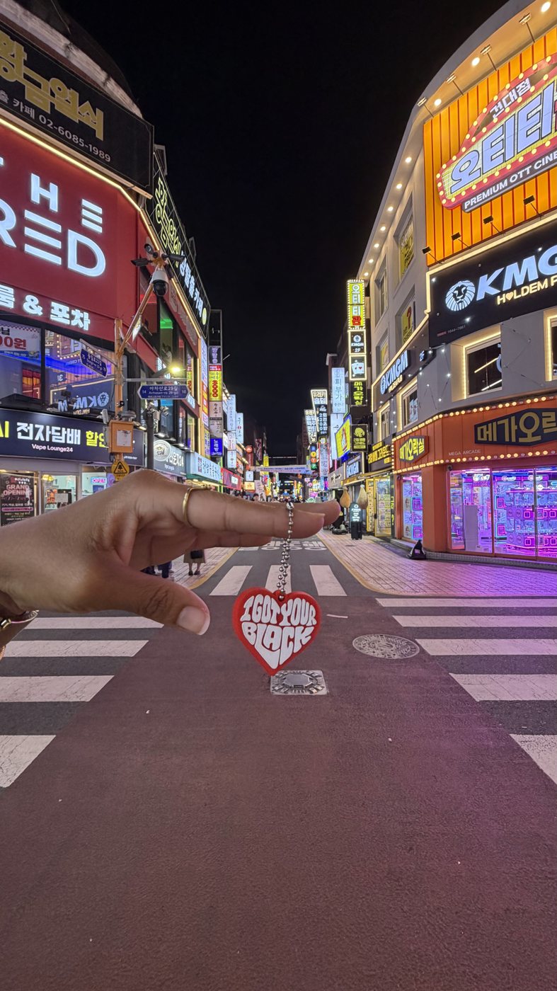 A neon-lit street at night in Korea