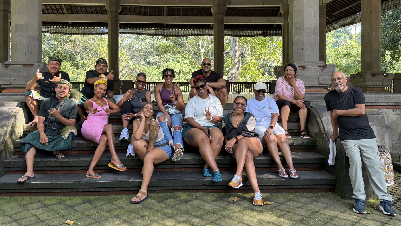 The group at a covered pavilion in Bali