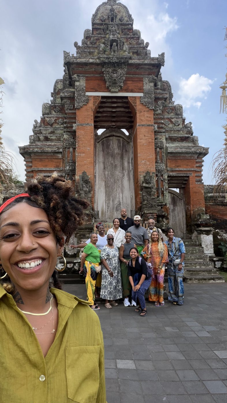 The group at a temple gate in Bali