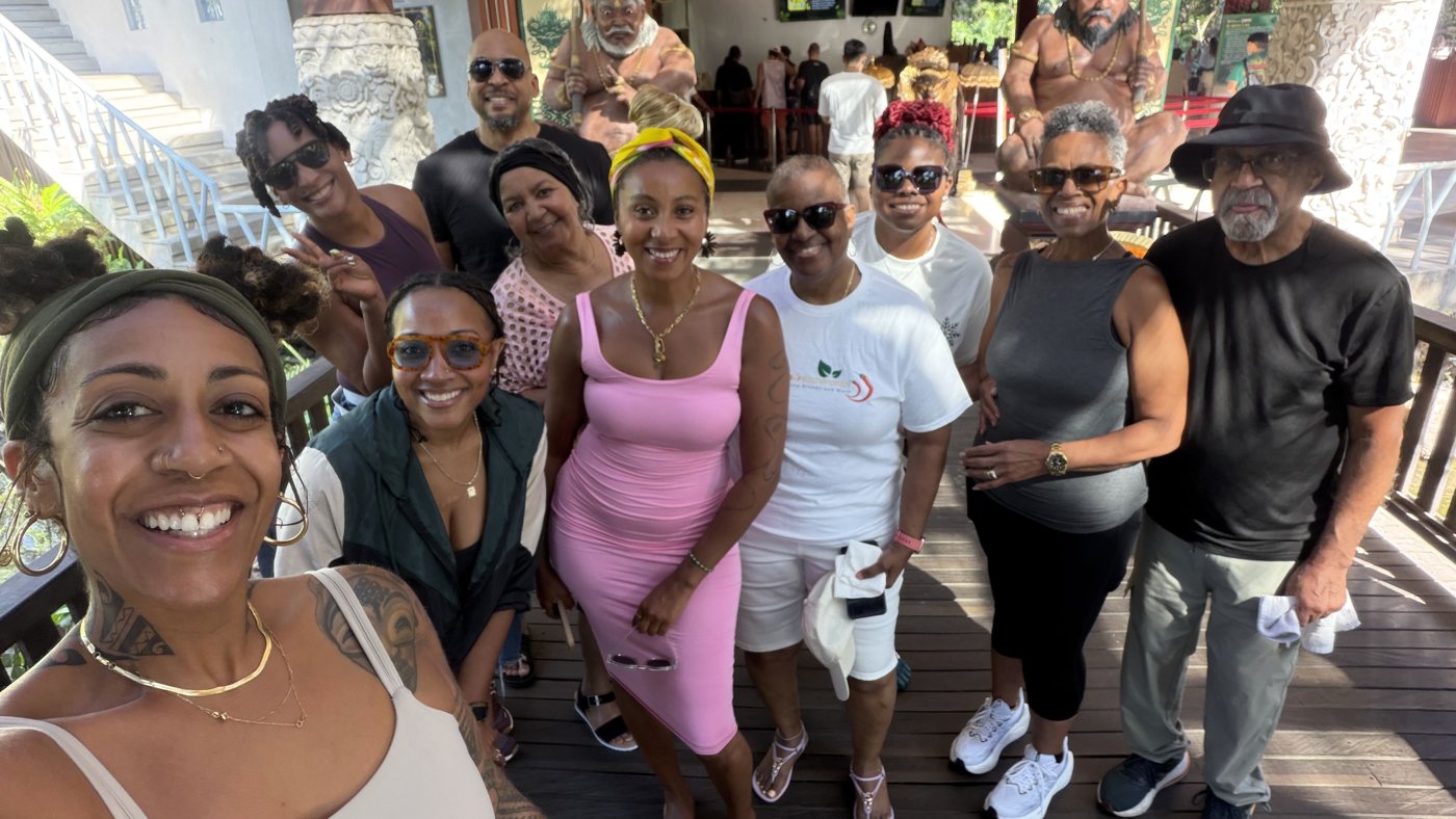 Ashleigh Bing with a big group on a boardwalk