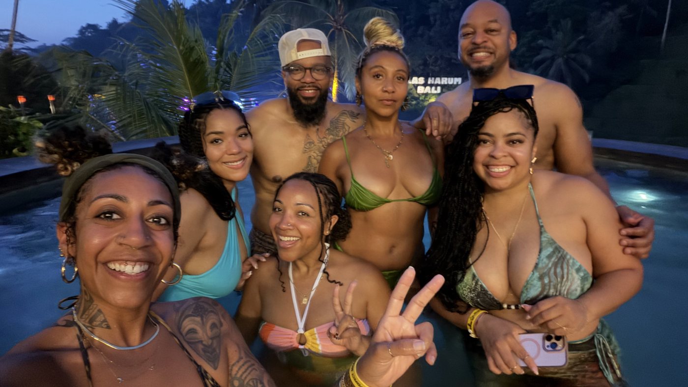 Ashleigh Bing with friends around a pool in the evening